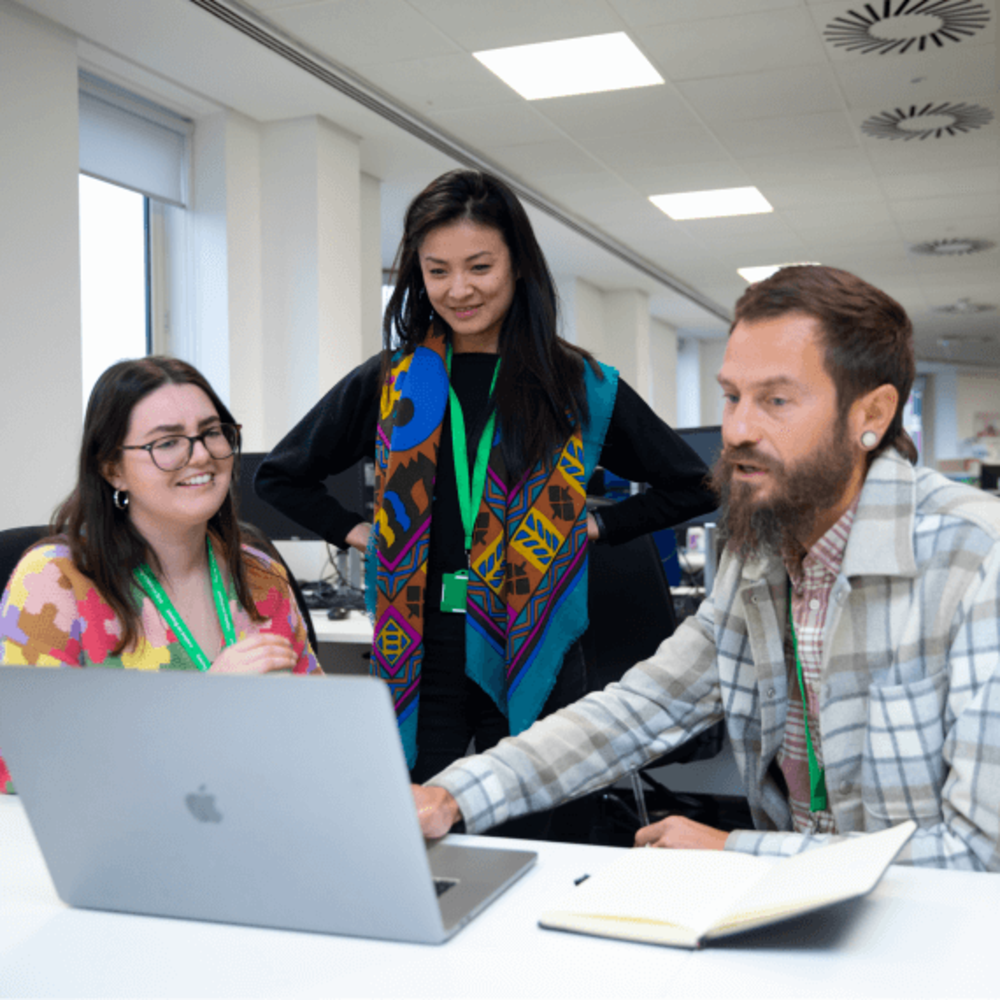 workers in front of computer