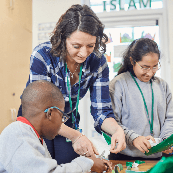 woman helping kids